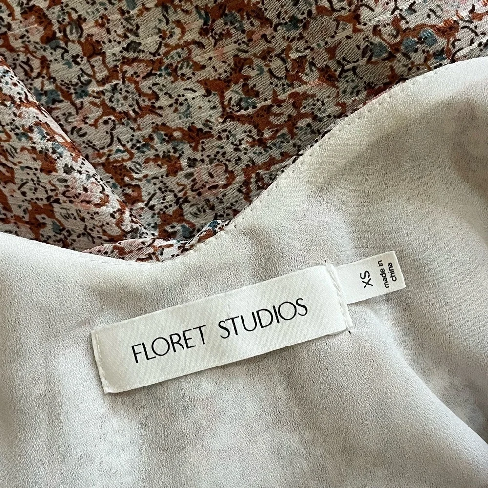 FLORET STUDIOS | Cold Shoulder Asymmetric Ruffle Dress In Rust-Cream | Size XS